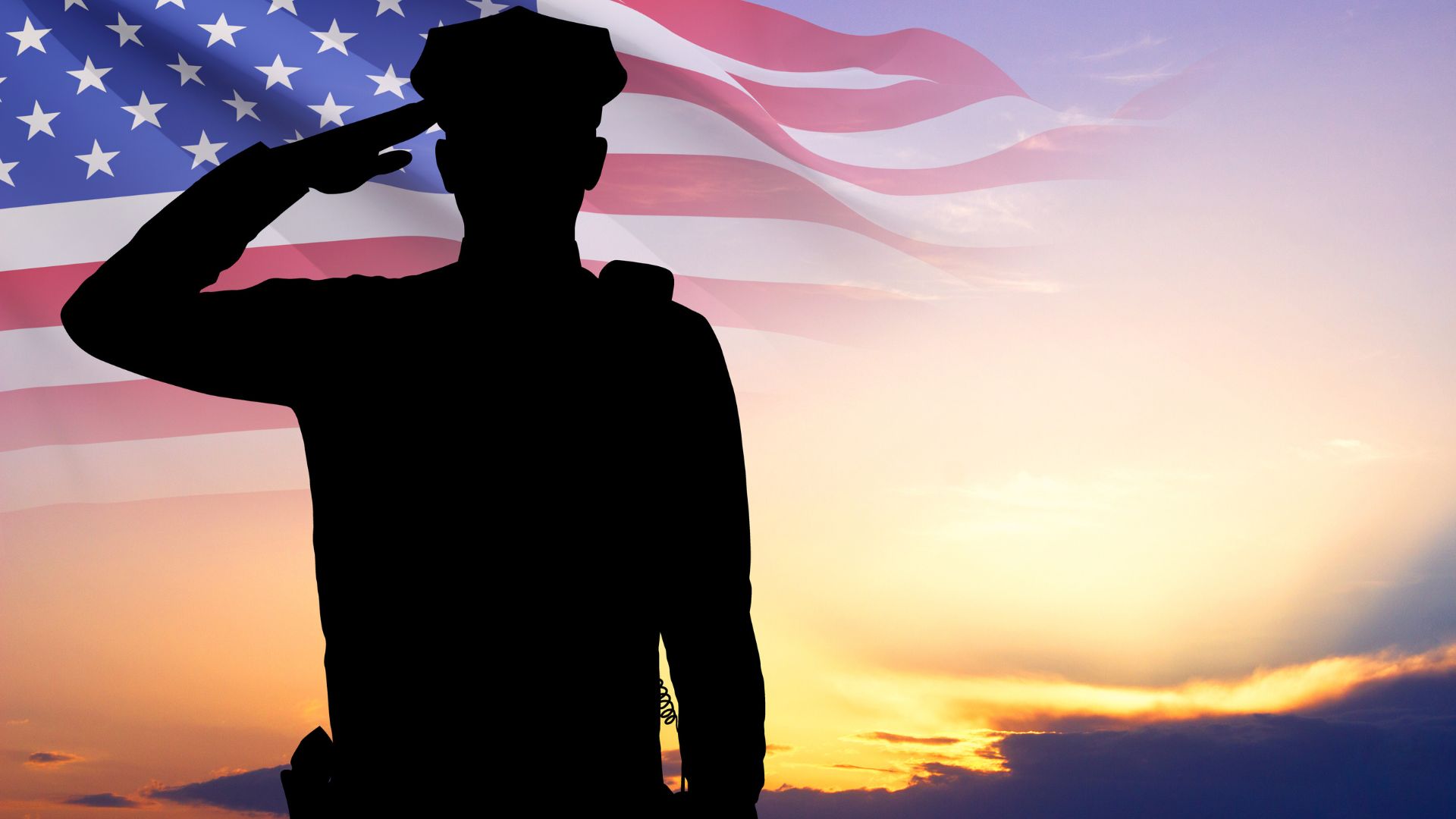 Veteran saluting the American flag, symbolizing service, sacrifice, and legacy.