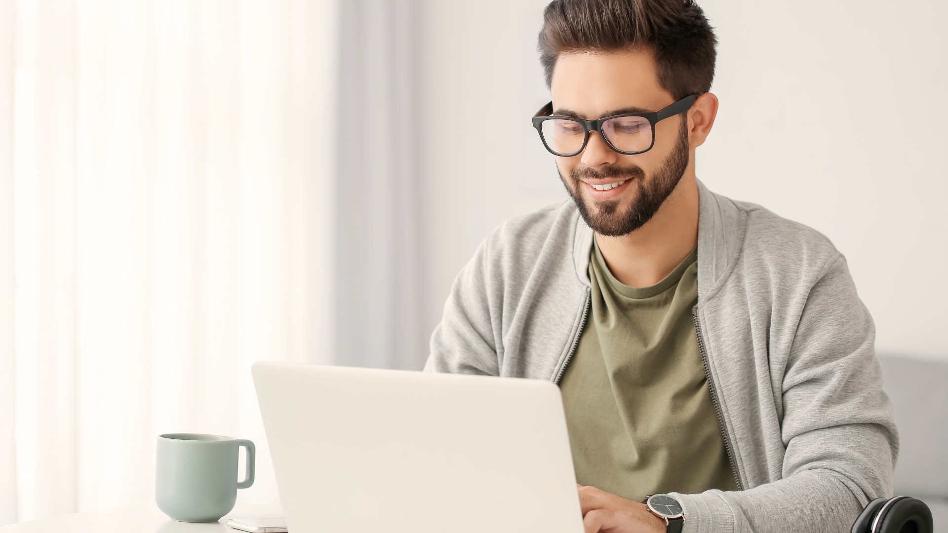 Adult student learning online with a laptop, symbolizing lifelong growth through education.