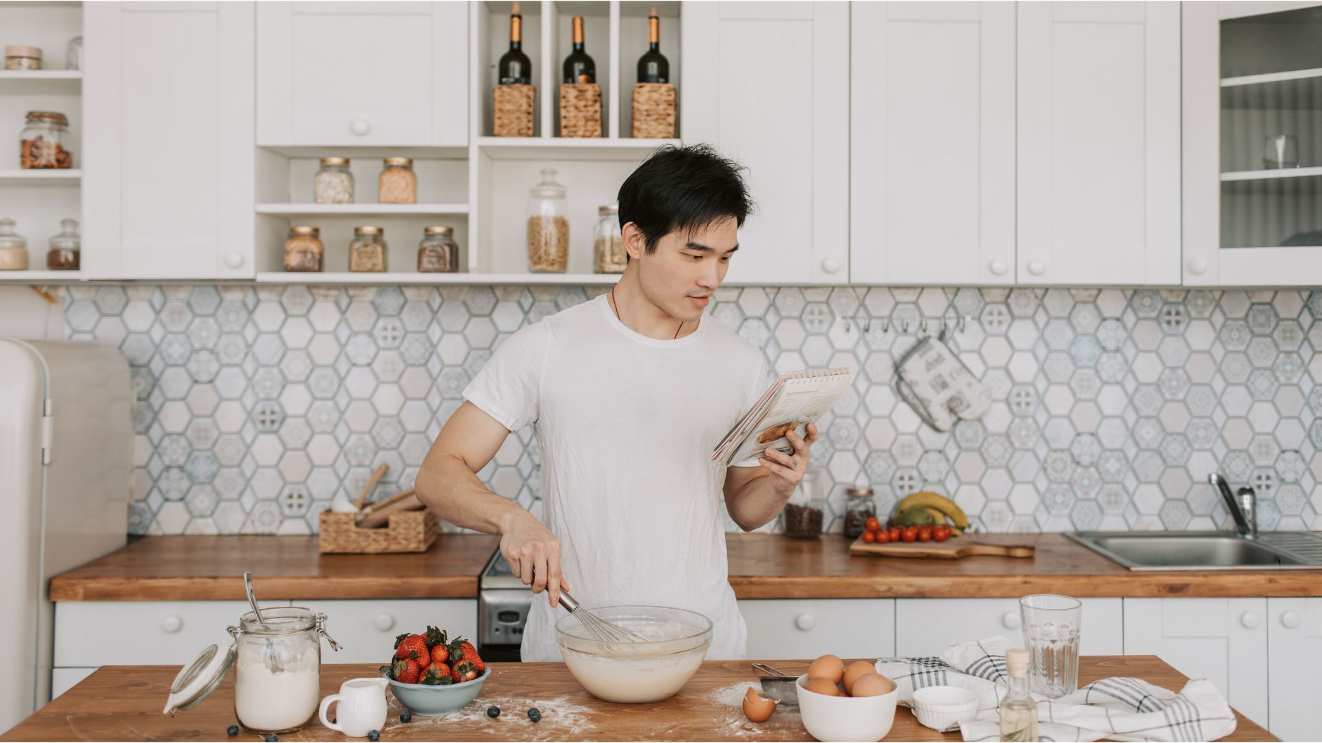 A man preparing a homemade meal in a cozy kitchen on National Men Make Dinner Day