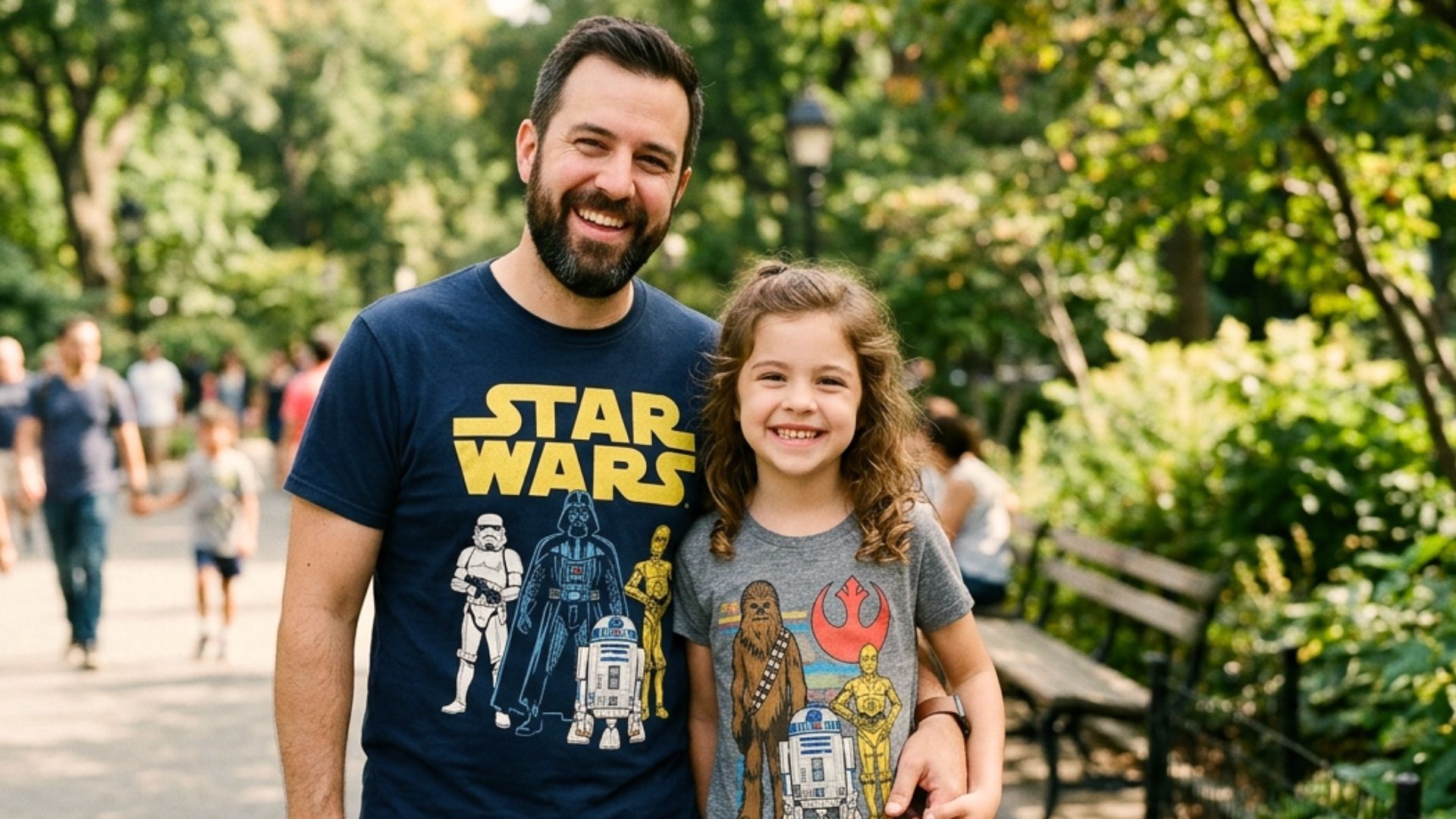 Father and daughter wearing Star Wars t-shirts celebrating Star Wars Day